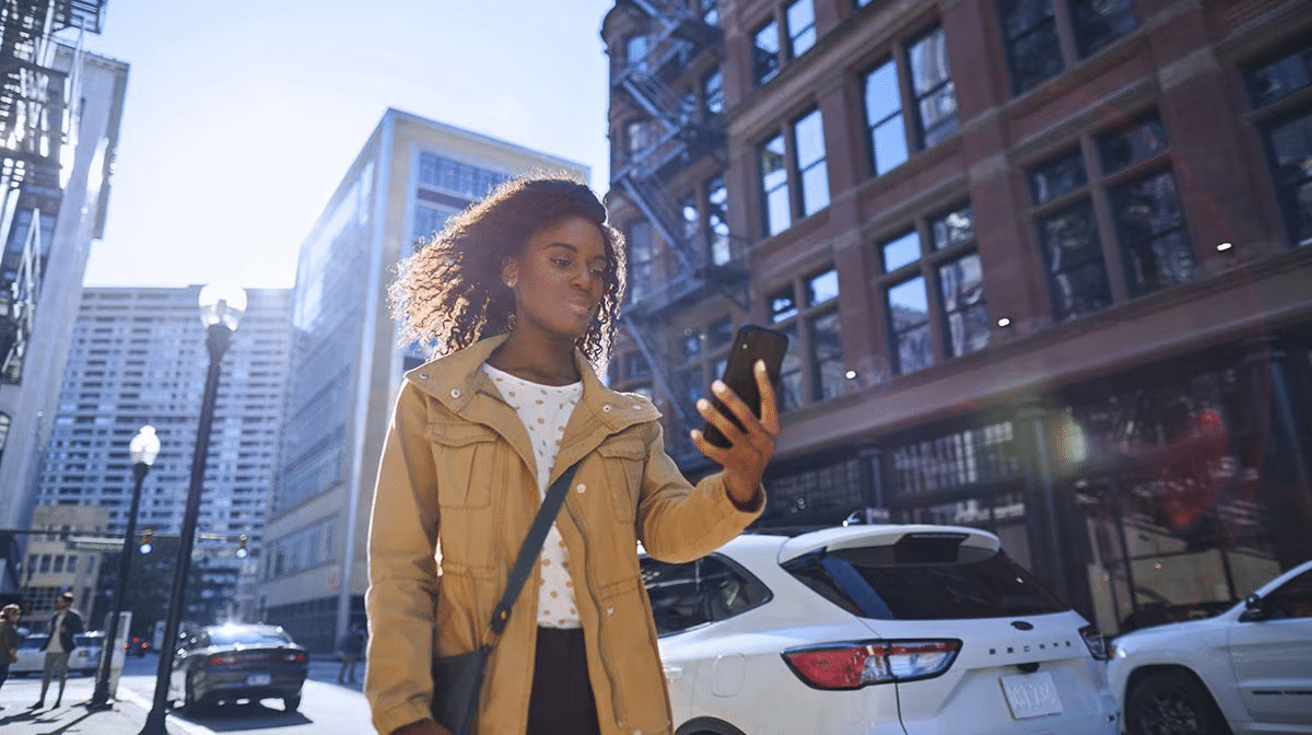 woman using the FordPass app