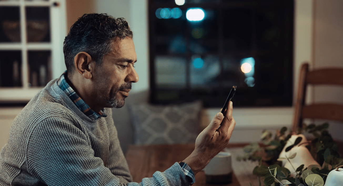 Person looking at a smartphone.