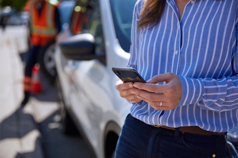 A Ford owner checks out their vehicle health through the FordPass App. 