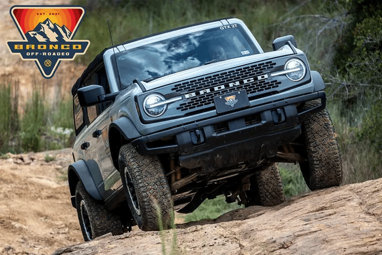 Bronco Off-Roadeo. A Ford Bronco climbs a hill on an off-road trail. 
