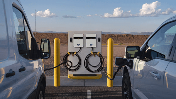 Ford E-Transit and Ford Lightning plugged into depot charging outdoors