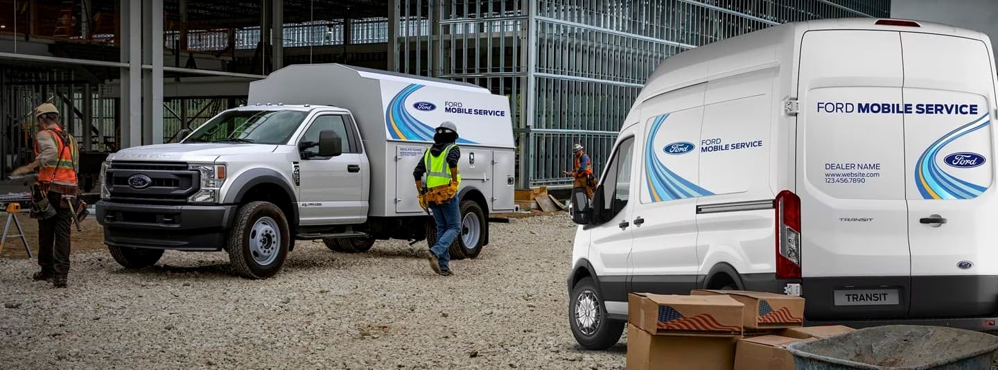 Construction site with Ford service vehicles.