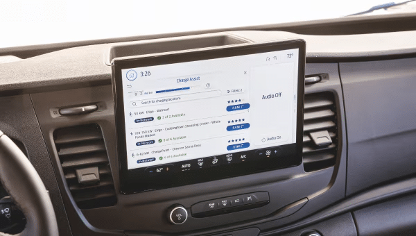 A car dashboard with a screen