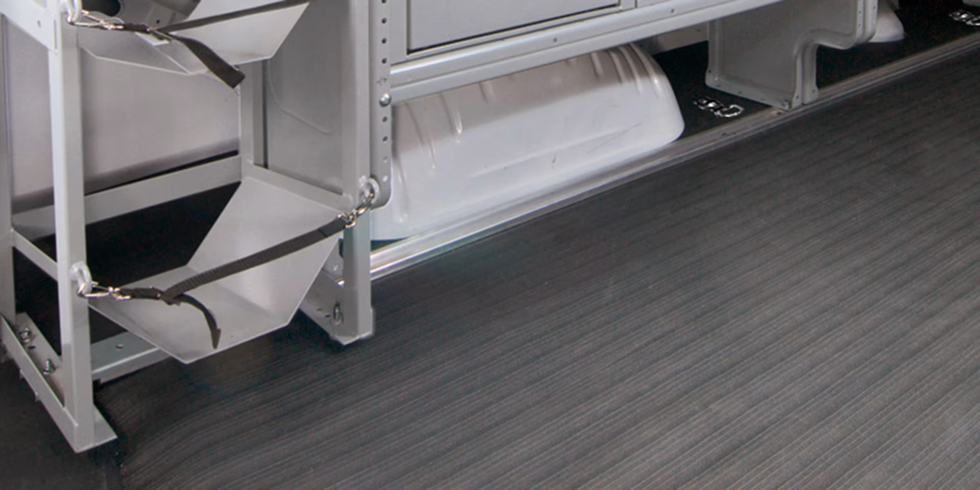 FLOOR COVERING AND TIE-DOWNS
